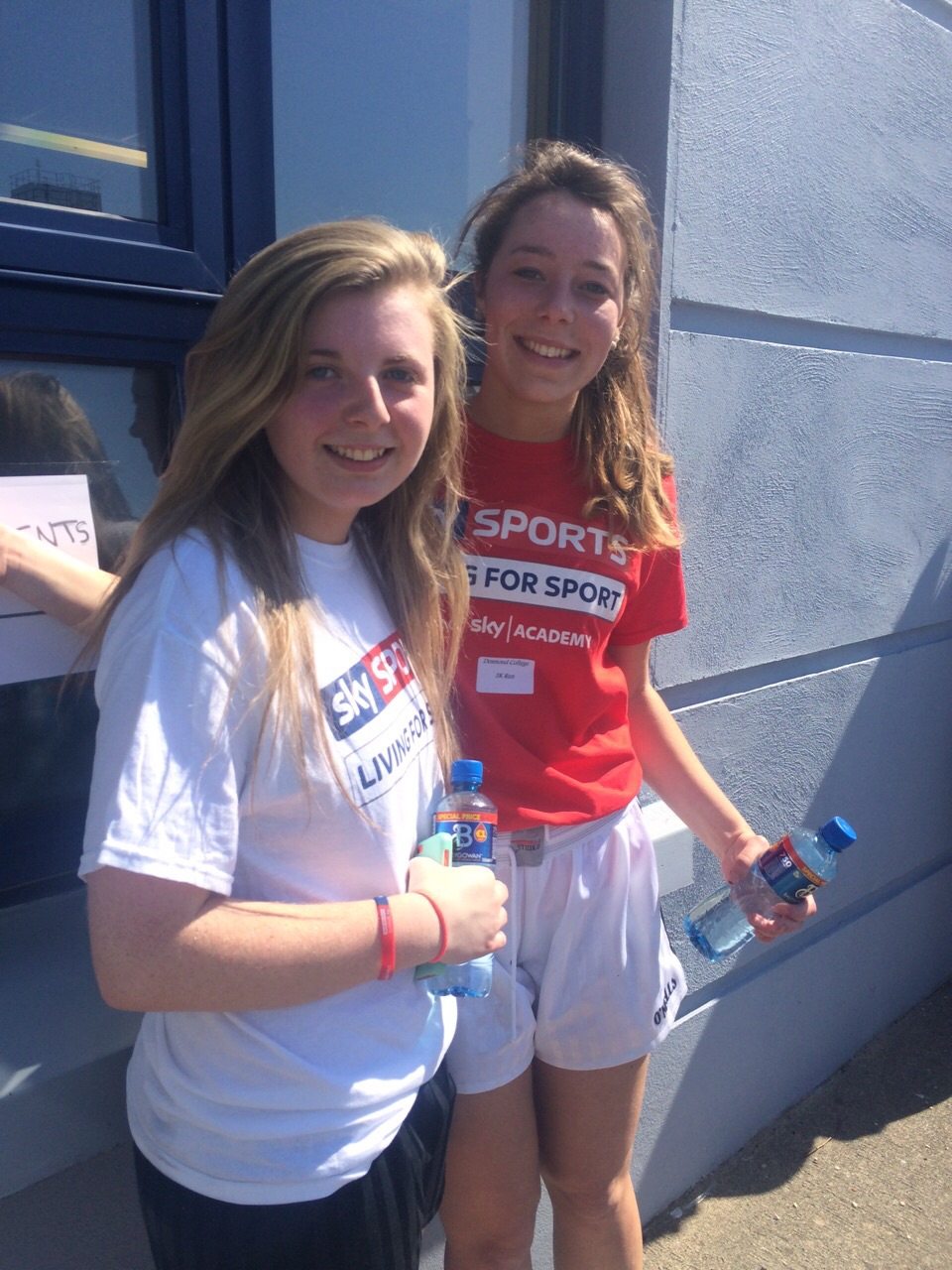 Julie Cantillon and Kiara Carroll take a minute to hydrate after completing the 5km run for Console charity, on Sunday 19th April 2015